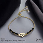Yenilenmeyi Yansıtan Kalp Motifli ve Siyah Taşlı 14 Ayar Altın Plakalı Ekim Bilekliği
