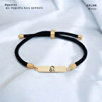 Güneşin Işıltısını Taşıyan Siyah Örgülü Dikdörtgen Motifli 14 Ayar Altın Plakalı Ağustos Bilekliği