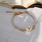 Çiçeklerin Zarafetini Taşıyan Beyaz Deri Tasarımlı 14 Ayar Altın Plakalı Mayıs Bilekliği