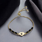 Benzersiz Zarafette Kalp Motifli Siyah Taşlı 14 Ayar Altın Plakalı Peri Bilekliği