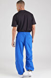 Nike Tech Woven Oversized Pants Flat Pewter Paraşüt Kumaş Erkek Oversize Bol Kesim Eşofman Altı Sax Mavi