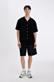 DeFacto Relax Fit Yazlık Polo Yaka Basic Düz Kısa Kollu Siyah Gömlek C8157AX24SMBK81