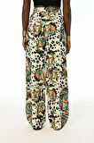 KADIN YAPRAK DESENLİ RAHAT KALIP BELİ LASTİKLİ BOL PAÇA PANTOLON