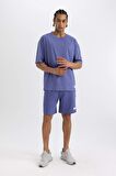 DeFactoFit Slim Fit Dar Kesim Cepli Baskılı Sporcu Şort A1625AX24SMPR484