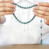 Sistemli Arpa Kesim Turkuaz-Beyaz Sıkma Kehribar Tesbih