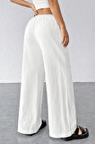 Kadın Beyaz Bol Kesim Cepli Geniş Paça Dökümlü Pantolon