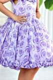 Kız Çocuk Yakası ve Etek Ucu Fırfırlı Üzeri Gül Baskılı Kolsuz Lila Elbise