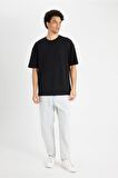 DeFacto %100 Pamuk Relax Fit Bisiklet Yaka Kısa Kollu Basic Düz Siyah Tişört D3673AX24AUBK81