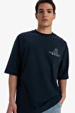 DeFacto %100 Pamuk Loose Fit Bisiklet Yaka Sırt Baskılı Kısa Kollu Tişört B4320AX25SMNV239