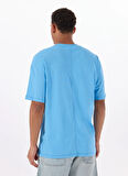 Reebok LC 6388 NEW ID OVRS GFX TEE Mavi Yuvarlak Yaka Oversize Baskılı Erkek T-Shirt
