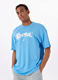Reebok LC 6388 NEW ID OVRS GFX TEE Mavi Yuvarlak Yaka Oversize Baskılı Erkek T-Shirt