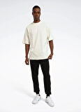 Reebok LC 1012 GARMEN ACT TEE Bej Yuvarlak Yaka Regular Fit Düz Erkek T-Shirt