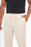 Keten Görünümlü Dökümlü Beli Lastikli Ekru Pantolon