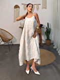 YAZLIK İNCE ASKILI DOKUMA KREM UÇUŞ UÇUŞ ELBİSE 