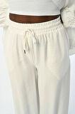 KADIN RAHAT KALIP BOL PAÇA BELİ LASTİKLİ DÜZ RENK PANTOLON