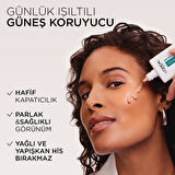 L'Oréal Paris Bright Reveal Spf 50+ Koyu Leke Karşıtı Renkli Fluid Günlük Yüz Güneş Kremi 50 ml - Medium