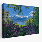 Mor Çiçekler Arasındaki Göl Manzaralı Ev Duvar Tablosu-3673