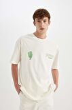 DeFacto %100 Pamuk Comfort Regular Fit Rahat Kesim Bisiklet Yaka Sırt Baskılı Kısa Kollu Tişört B8488AX24AUER105
