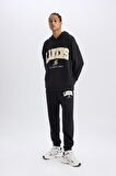 DeFactoFit NBA Los Angeles Lakers Jogger Eşofman Altı Standart Fit Cepli Esnek Bantlı Paça Skuba Dalgıç Kumaş D6723AX25SPBK82