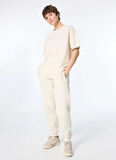 Asics 2032C844-200 ASICS LOGO SWEATPANT Bej Lastikli Bel Normal Düz Kadın Eşofman Altı