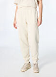 Asics 2032C844-200 ASICS LOGO SWEATPANT Bej Lastikli Bel Normal Düz Kadın Eşofman Altı
