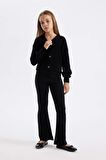DeFacto Kız Çocuk Flare Fit İspanyol Paça Basic Düz Triko Pantolon A6029A824WNBK27