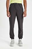 DeFactoFit Sporcu Jogger Eşofman Altı Standart Fit Çift Cepli Dokuma Beli Paçası Lastikli B5147AX24SPAR231