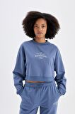 DeFactoFit Oversize Geniş Kalıp Bisiklet Yaka Baskılı Sporcu Sweatshirt C9405AX24AUIN236