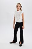 DeFacto Kız Çocuk Flare Fit Yırtmaçlı Pantolon B6893A825SMBK81