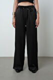 Kadın Düz Renk Parlak Kumaş Bol Paça Beli Lastikli Pantolon