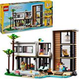 LEGO® Creator 3#ü 1 Arada Modern Ev 31153 # 9 Yaş ve Üzeri İçin 3 Katlı Şehir Binası veya Orman Kulübesi İçeren Yaratıcı Oyuncak Yapım Seti (939 Parça)