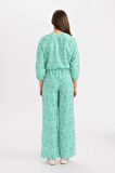 DeFacto Wide Leg Geniş Bol Paça Pantolon Desenli Esnek Belli Paça Yırtmaç Detaylı Cepli C9161AX24SMGN700