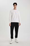 DeFacto Regular Fit Jogger Eşofman Altı Beli Bağcıklı Lastikli Paça Cepli C5384AX24SPBK81