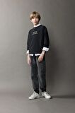 DeFacto Erkek Çocuk Oversize Geniş Kalıp Bisiklet Yaka Sırt Baskılı Yıkamalı Soluk Efektli Sweatshirt D8494A825SPBK81