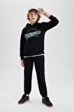 DeFacto Erkek Çocuk Beli Bağcıklı Cepli Lastikli Paça Jogger Basic Düz Pantolon B6713A824SMBK81