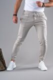 SLİMFİT DAR PAÇA BELİ LASTİKLİ İPLİKLİ LİKRALI JOGGER PANTOLON