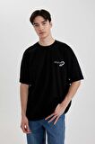 DeFacto Loose Fit Bisiklet Yaka Sırt Baskılı Kısa Kollu Tişört B8949AX24SMBK81
