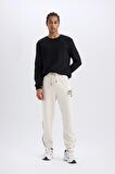DeFactoFit NBA Milwaukee Bucks Jogger Eşofman Altı Standart Fit Cepli Esnek Bantlı Paça Skuba Dalgıç Kumaş D6725AX25SPBG662
