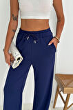 Kadın Lastikli Bel Bağcıklı Bol Paça Pantolon – Rahat & Minimal Stil