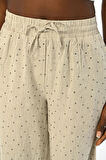KADIN BELİ LASTİKLİ BOL PAÇA ÖNÜ TAŞ İŞLEMELİ KETEN PANTOLON