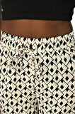 KADIN DESENLİ BELİ LASTİKLİ BOL PAÇA PANTOLON