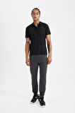 DeFactoFit Sporcu Dokuma Pantolon Slim Fit Dar Kesim Çift Cepli Fermuarlı Paça C9262AX24AUAR231