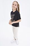 Siyah Oversize Yazı Baskılı O Yaka Düşük Omuz Kız Çocuk T-Shirt  - 75028 | 7-8 Yaş