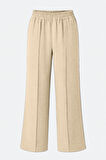 Mizalle  Keten Dokulu Beli Lastikli Bej Rengi Bol Kesim Pantolon