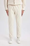 DeFacto Yazlık Jogger Pantolon Relax Fit Rahat Kesim Düz Paça Cepli Beli Bağcıklı B4521AX24SPBG144