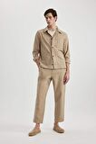 DeFacto Yazlık Jogger Pantolon Regular Fit Normal Kesim Keten Görünümlü Düz Paça Pamuklu Cepli B4138AX24SPBG773