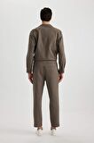 DeFacto Yazlık Jogger Pantolon Regular Fit Normal Kesim Keten Görünümlü Düz Paça Pamuklu Cepli B4138AX24SPBN571