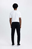 DeFactoFit Slim Fit Sporcu Jogger Eşofman Altı Dar Kesim Skuba Dalgıç Kumaş Standart Paça Beli Bağcıklı Lastikli Paça Z9112AZ24SPBK81