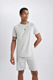 DeFactoFit Slim Fit Dar Kesim Bisiklet Yaka Baskılı Sporcu Kısa Kollu Tişört V2887AZ24SPGR91