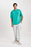 DeFactoFit Sporcu Jogger Eşofman Altı Standart Fit Kargo Cepli Dokuma Beli Paçası Lastikli C0043AX24SPBG143